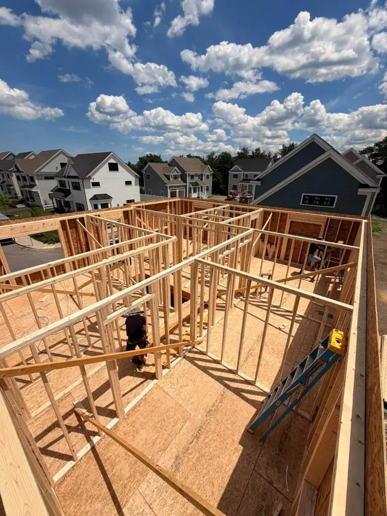 Wood framing structure in progress by Prime Core Construction